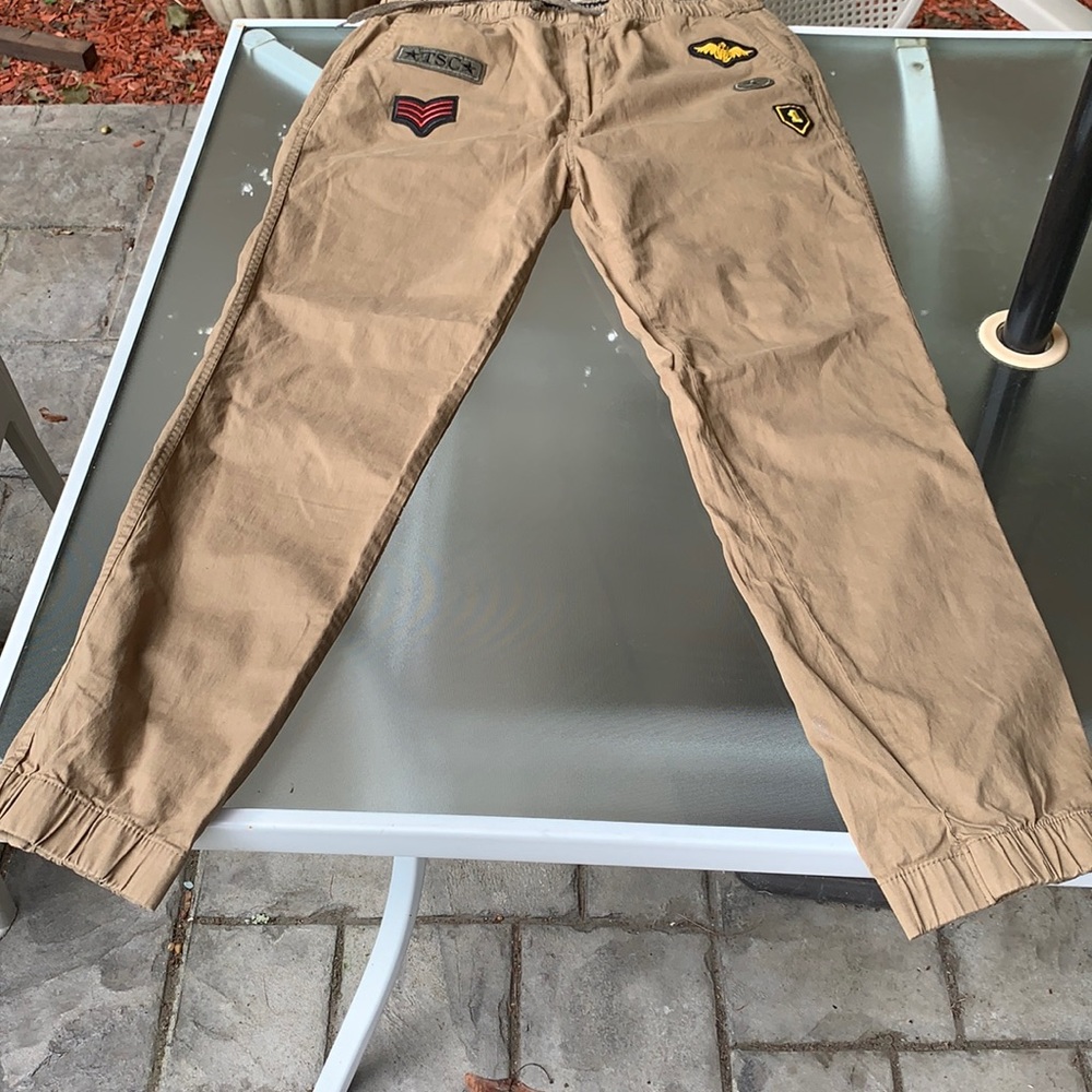 Brown with some designs with some logo